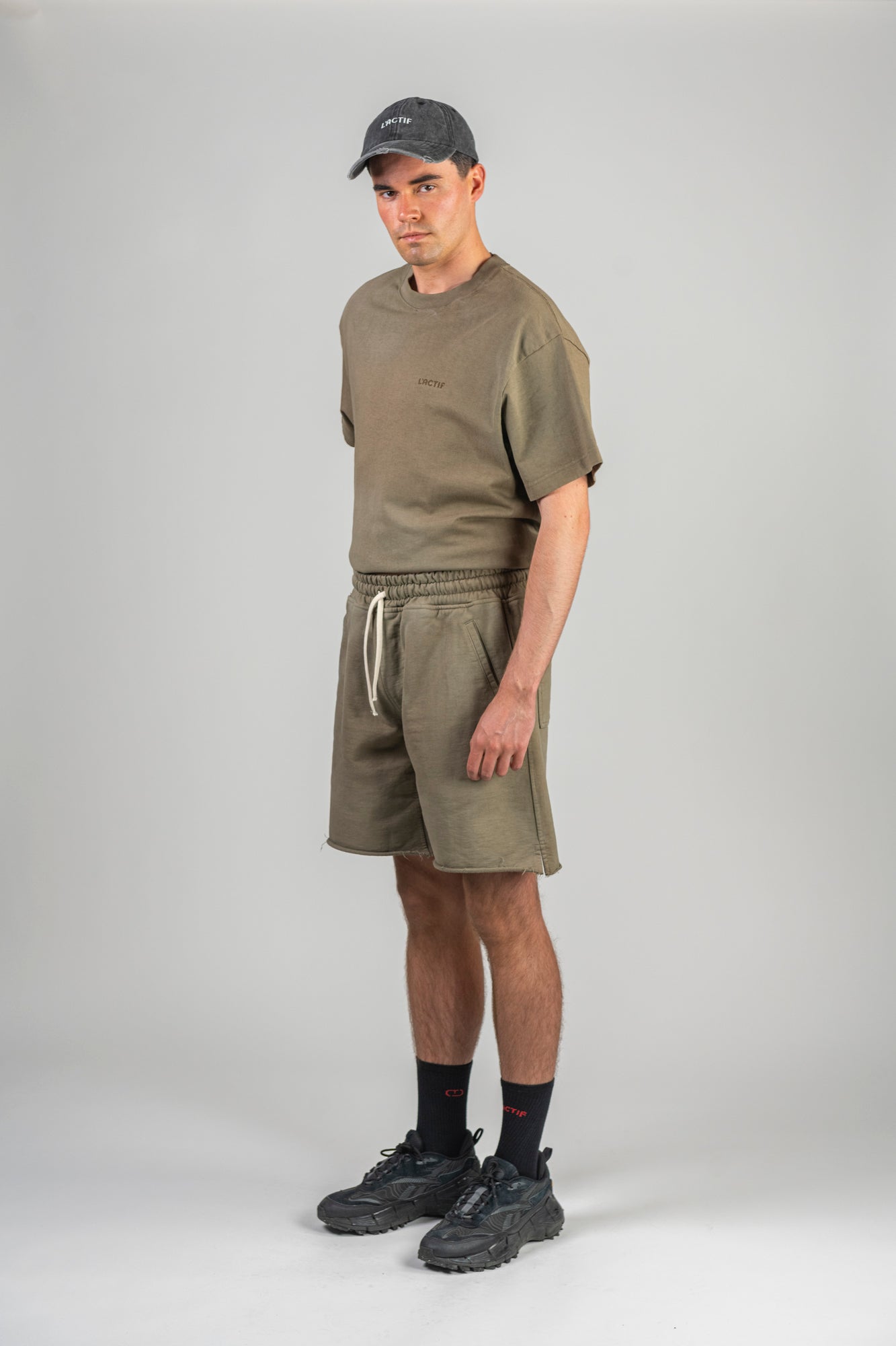green-shorts-male-left