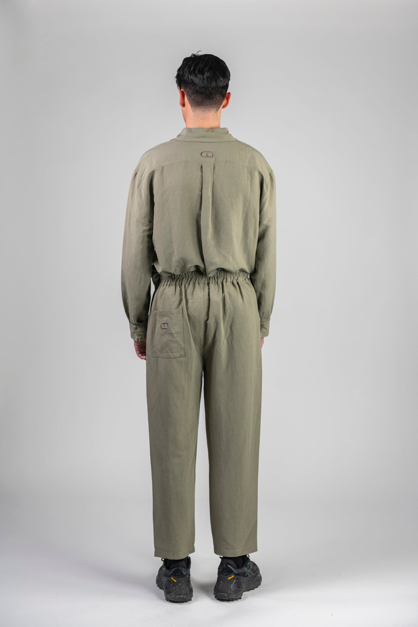 green-linen-pants-male-back