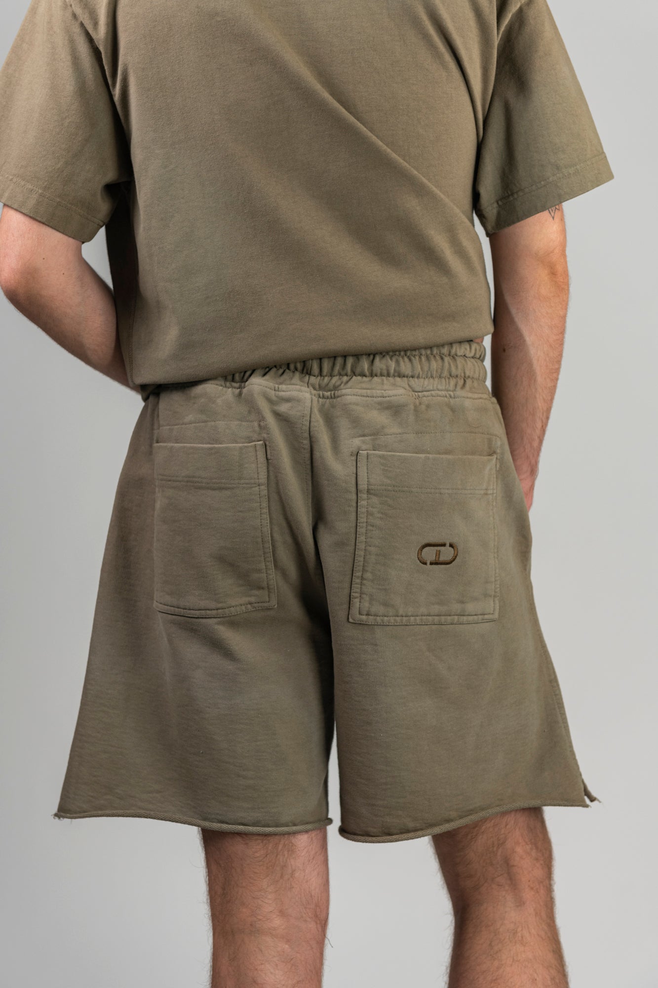 green-shorts-male-detail-back