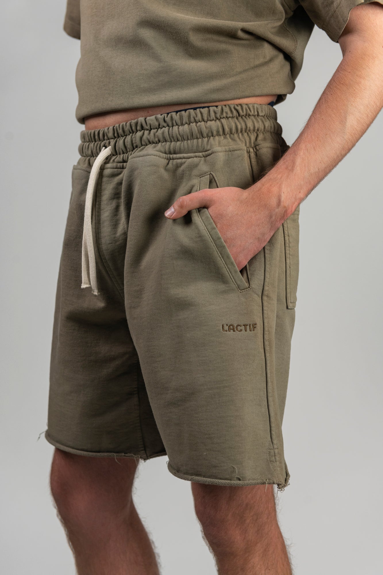 green-shorts-male-detail-left