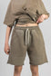 lactif-green-shorts-female-detail-front