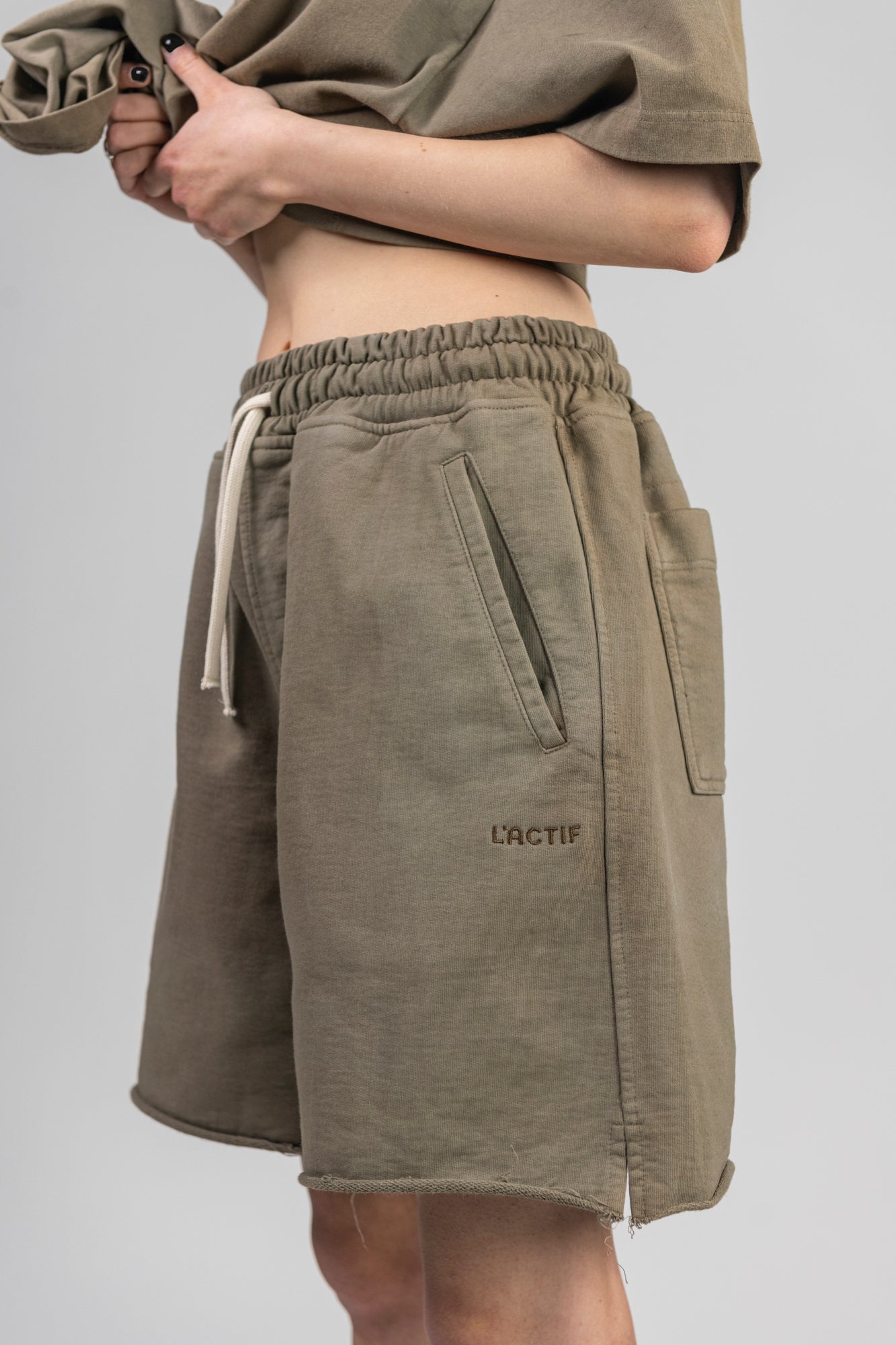 lactif-green-shorts-female-logo-detail