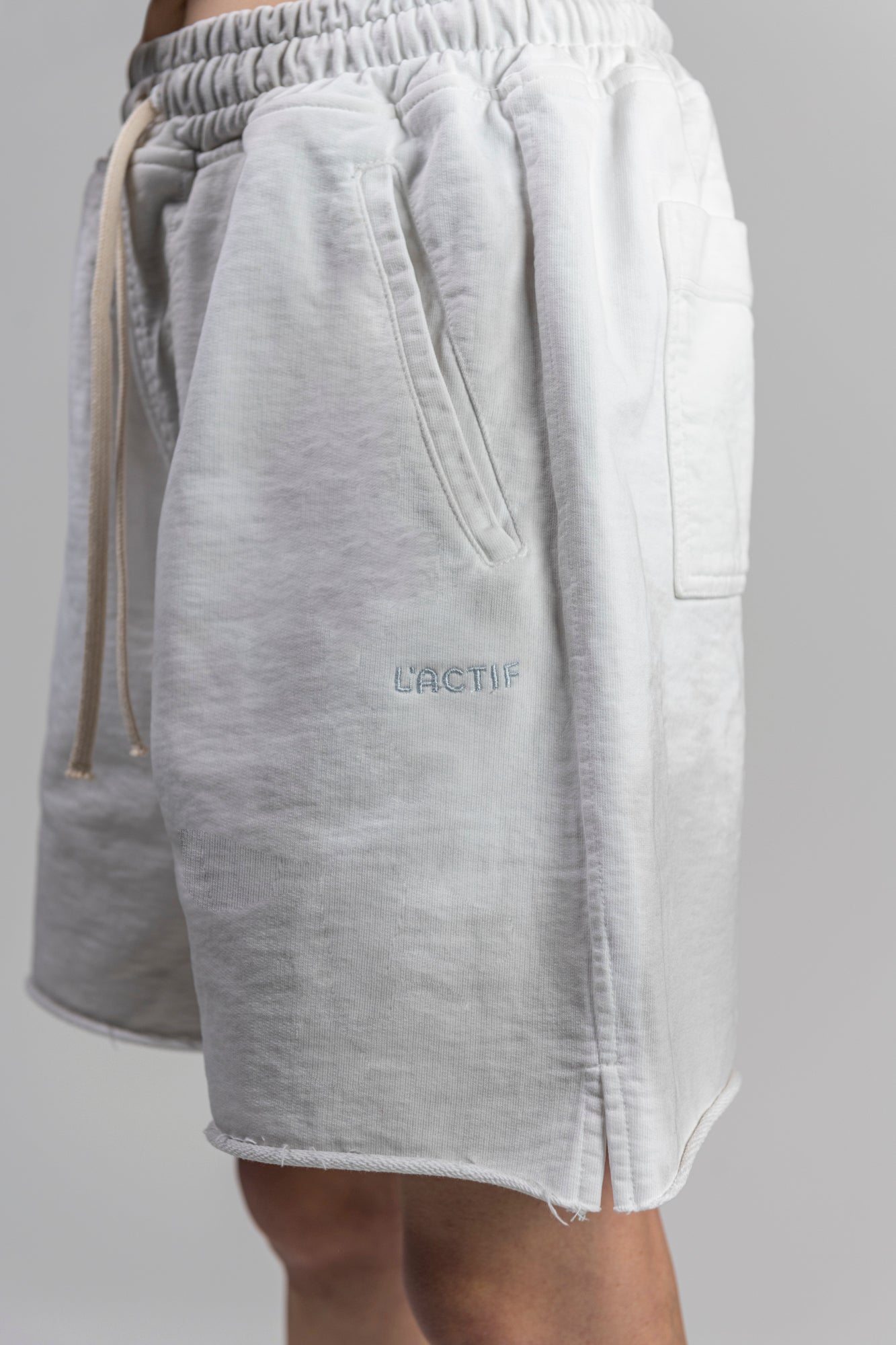 lactif-white-shorts-female-logo-detail