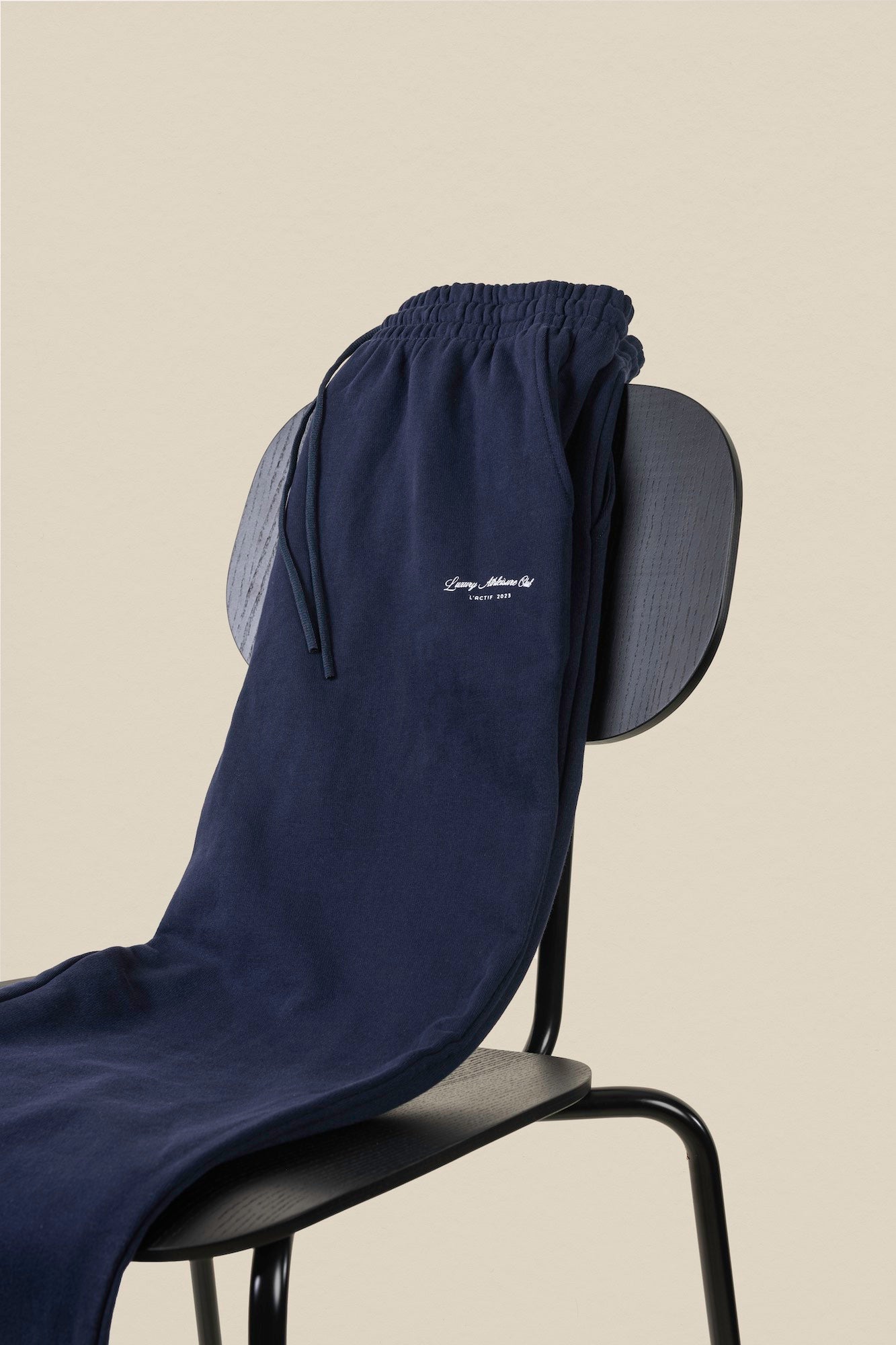 navy pants on chair